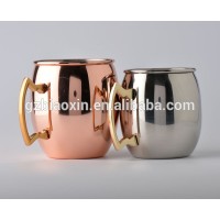 copper color Moscow Mule with gold color handle